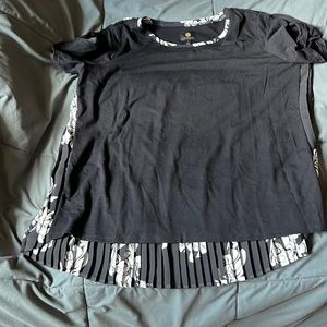 Top with open toe sleeve. Longer back
